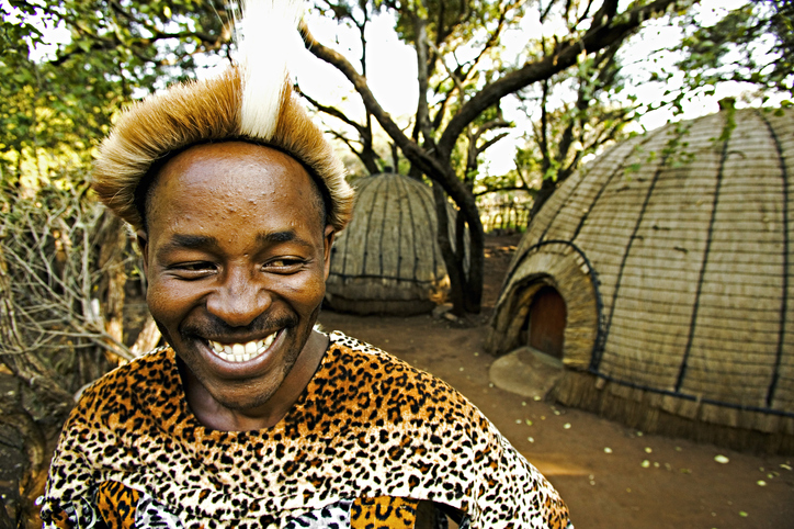 Portrait of Zulu man in traditional dress. Lesedi Cultural Village near Johannesburg South Africa