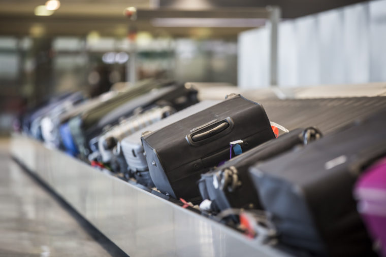 Lost Luggage Piles Up At SEA Airport Leaving Travelers Depending On GPS Trackers