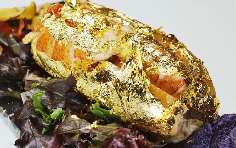 This Black-Owned Restaurant Serves Lobster Tails Wrapped In 24K Gold