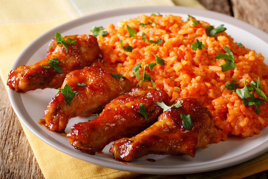 Nigerian Food Party Jollof Rice With Fried Chicken Wings Close Up | My ...