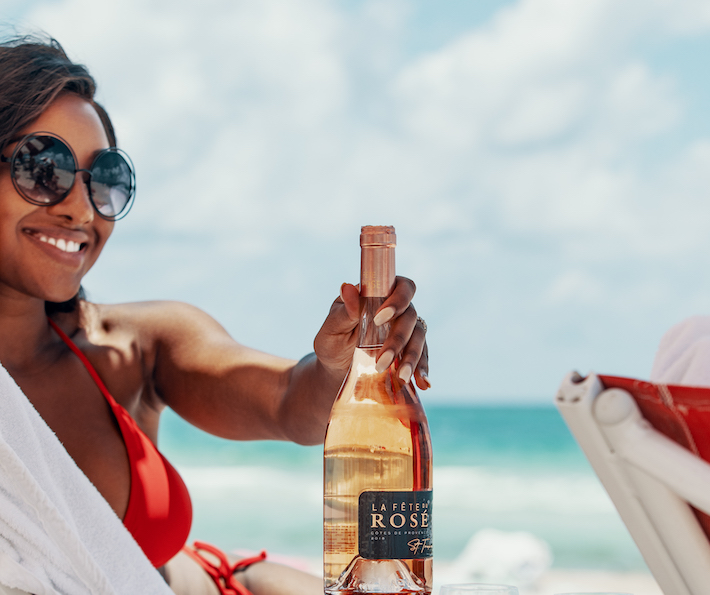 Meet Donae Burston Of La Fete du Rosé: The Black-Owned Rosé Brand That Also Gives Back To Underserved Youth