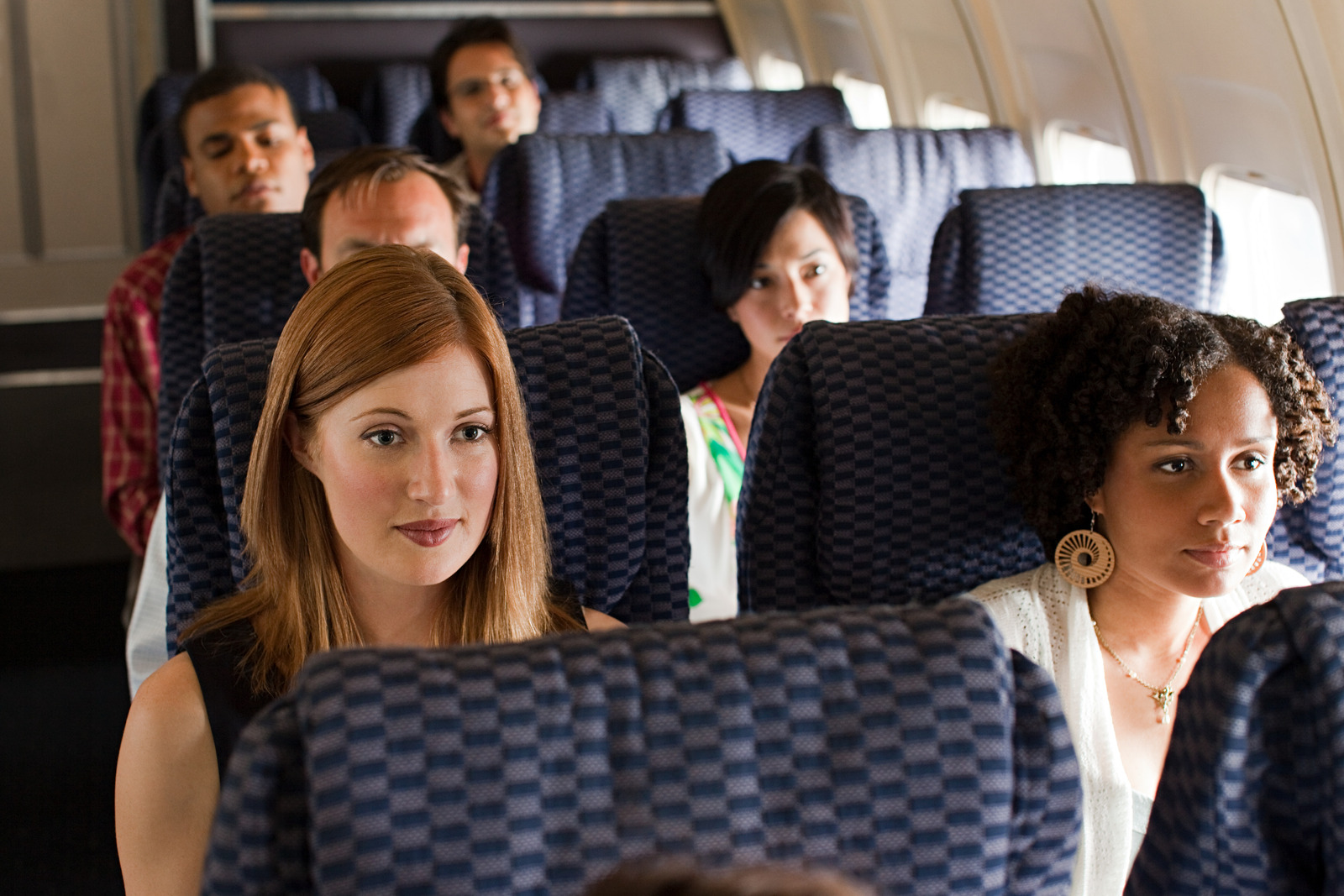 Woman Gets Choked Out On A Plane For Calling Black Flight Attendant The 'N' Word
