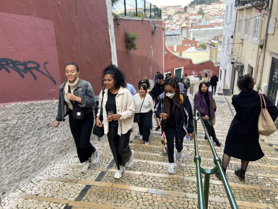 Black travelers on walking tour in Lisbon