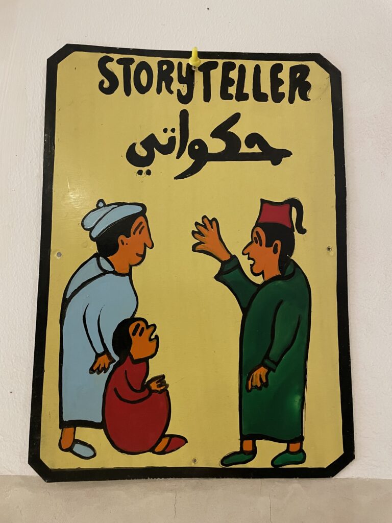 storyteller sign in arabic at the Marrakech International Storytelling Festival