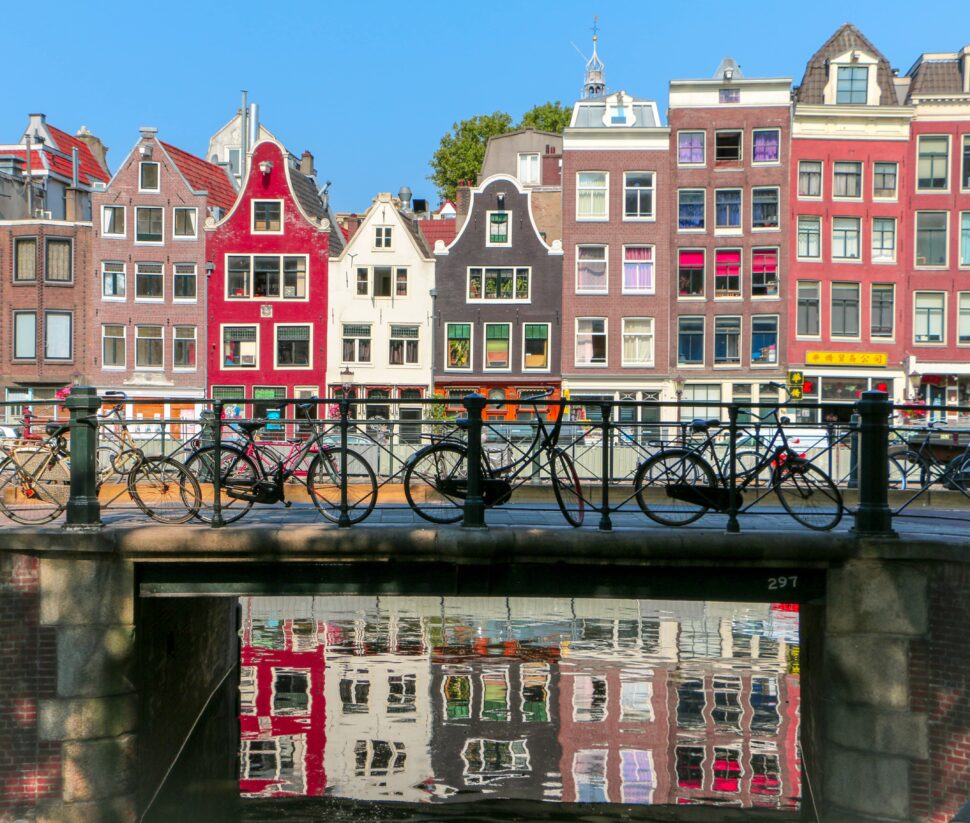 illustration of row houses and water canal in amsterdam