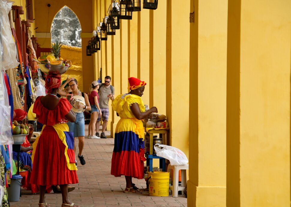 Women wearing traditional Colombian attire - Tour companies that teach Black history