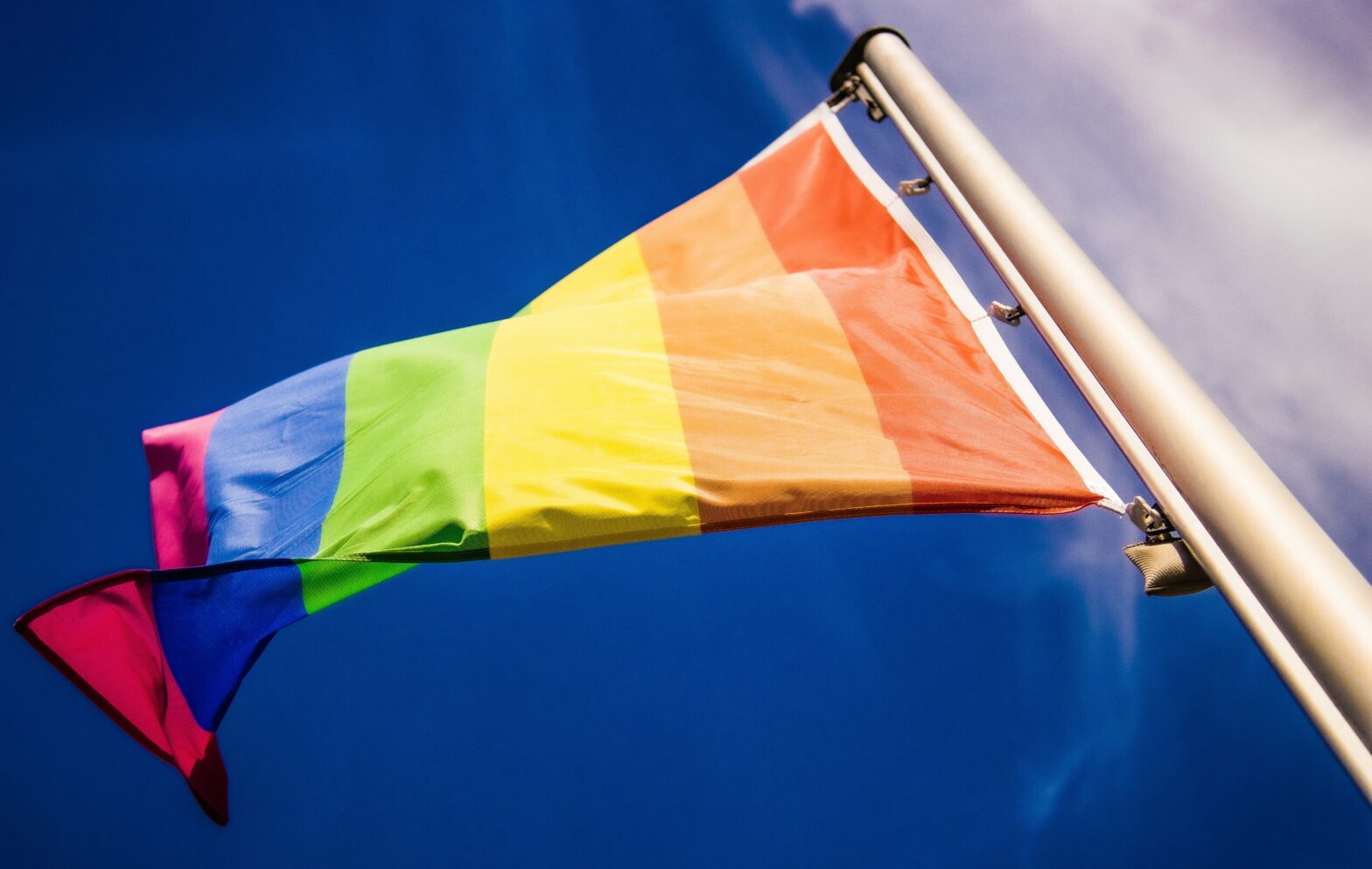 pride flag waving in the air