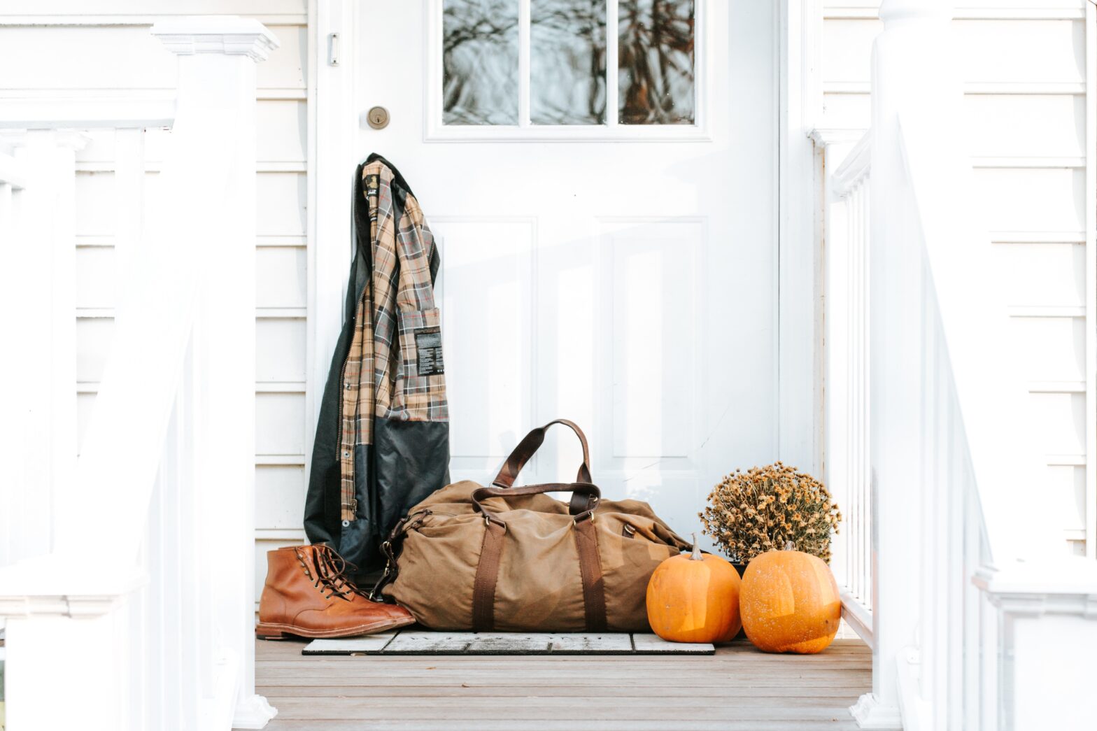 fall items sitting on a porch