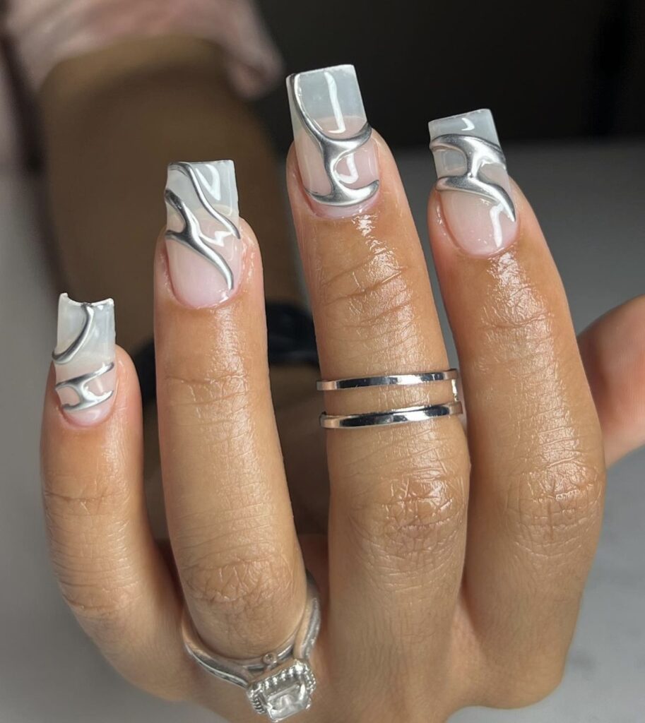 Chrome is a modern nail idea that is perfect for fashionistas on vacation. 