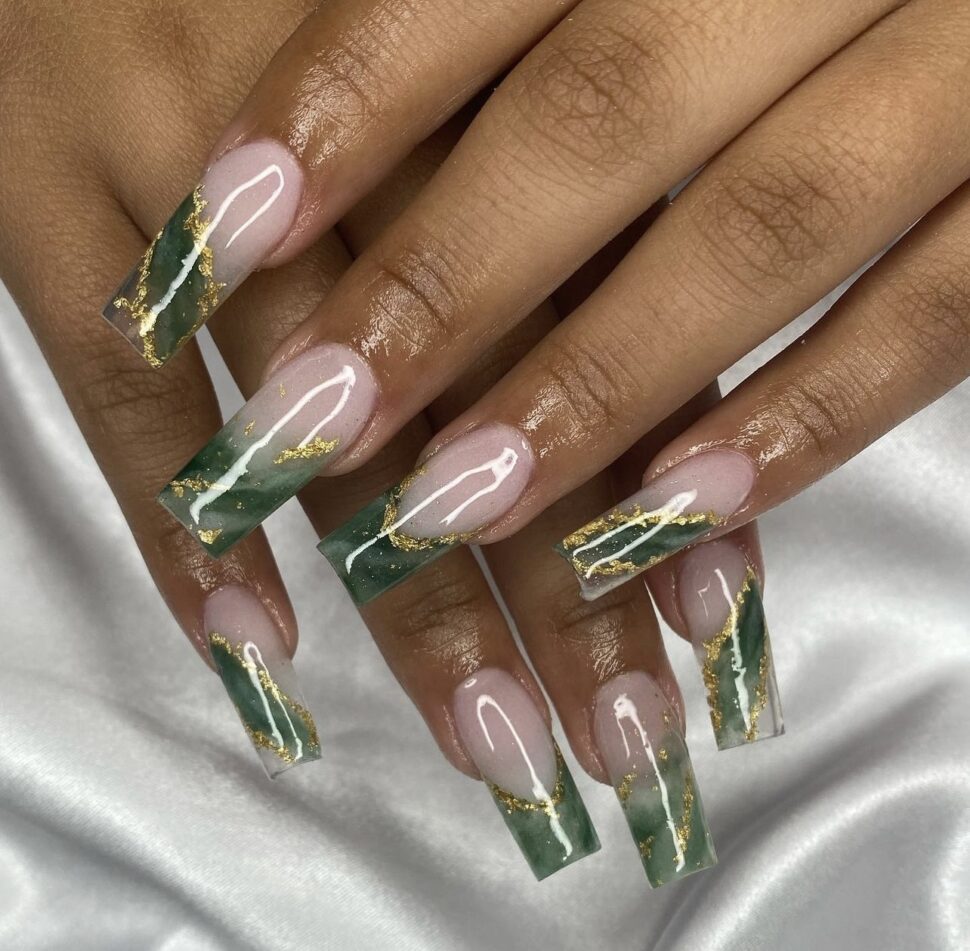 Jade nails resemble the precious stones and are often embellished with gold foils. Jade nails are a great vacation nail idea for people looking too mix up their style.