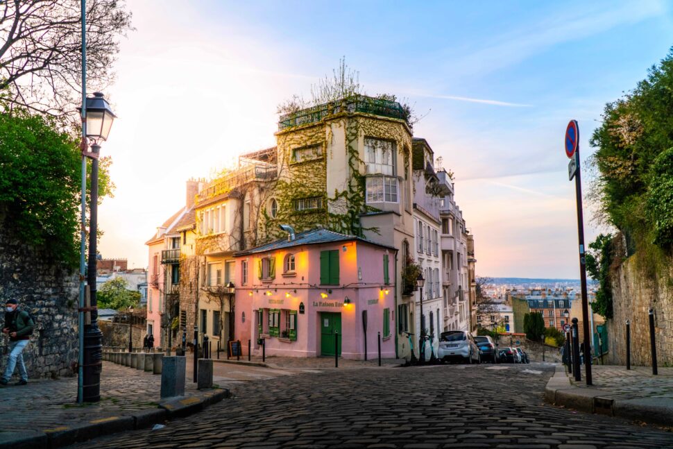 The 18th arrondissement offers cool bohemian spots that travelers can enjoy.
pictured: La Maison Rose in Montmartre, Paris France