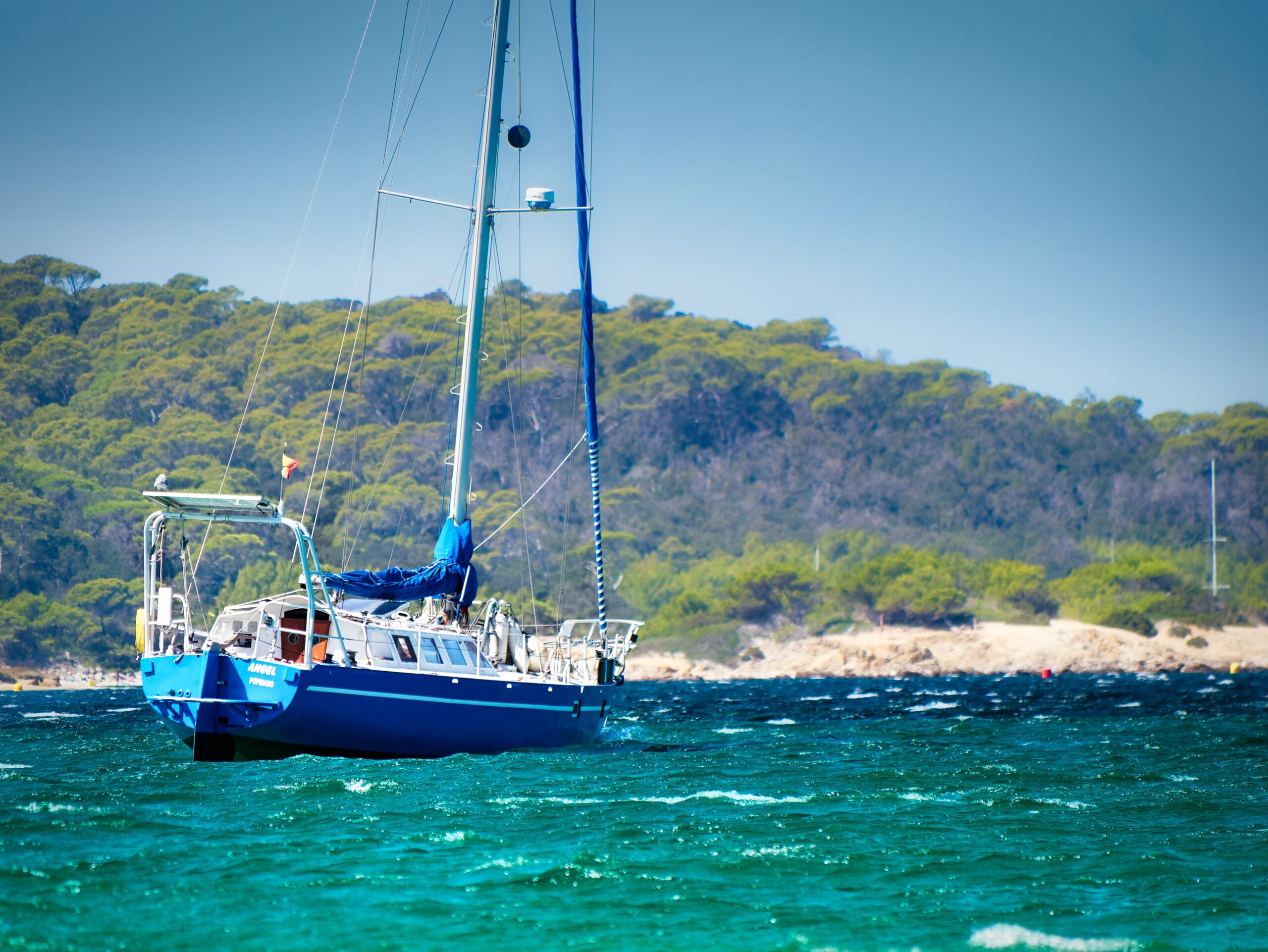 Porquerolles is a coastal area off the southern coast of France.
Pictured: A boat sailing near the shores of Porquerolles 