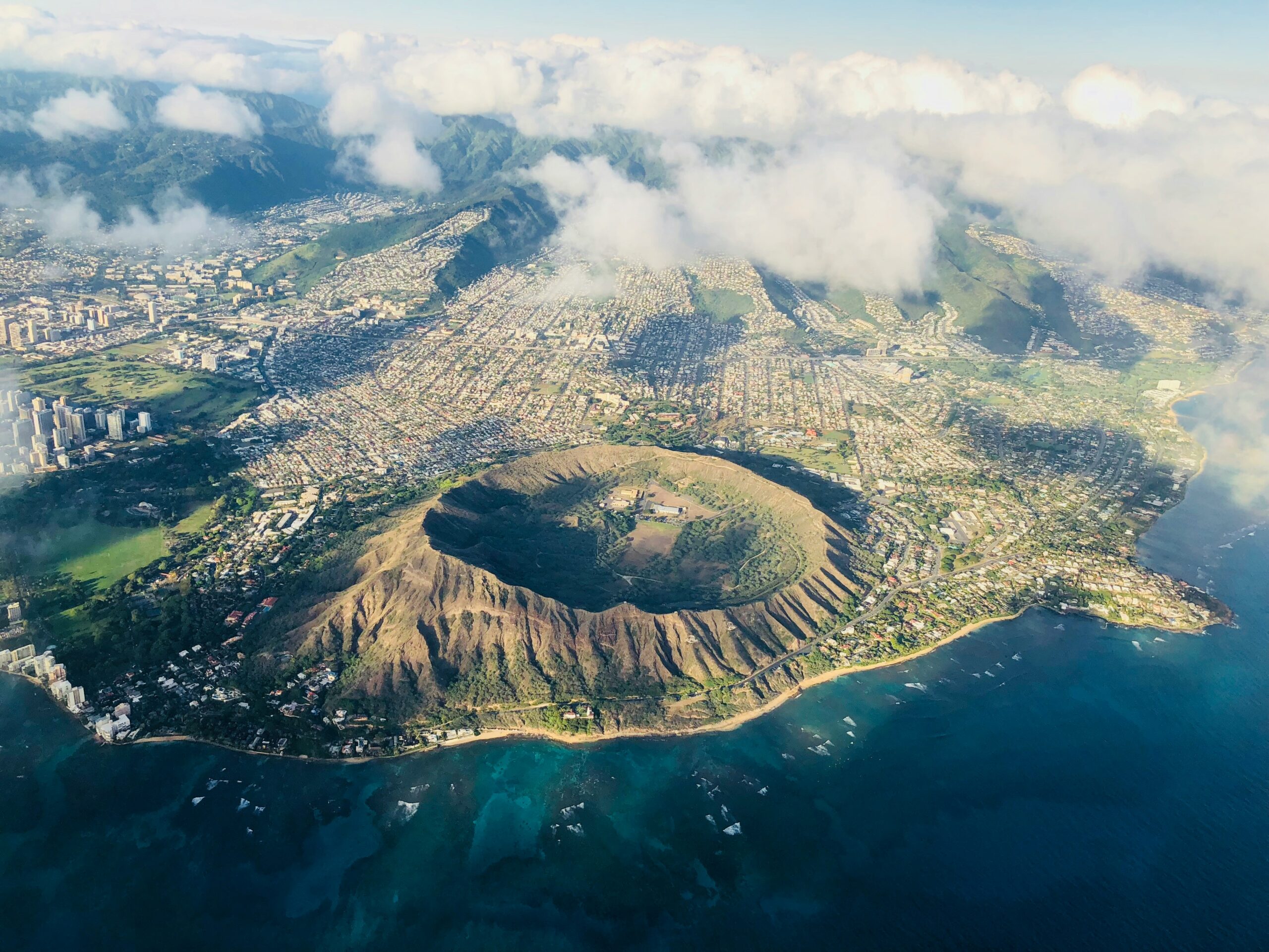 Oahu is one of the most popular tourist islands in Hawaii. 
Pictured: an aerial shot of the island of Oahu and the surrounding metropolitan area 