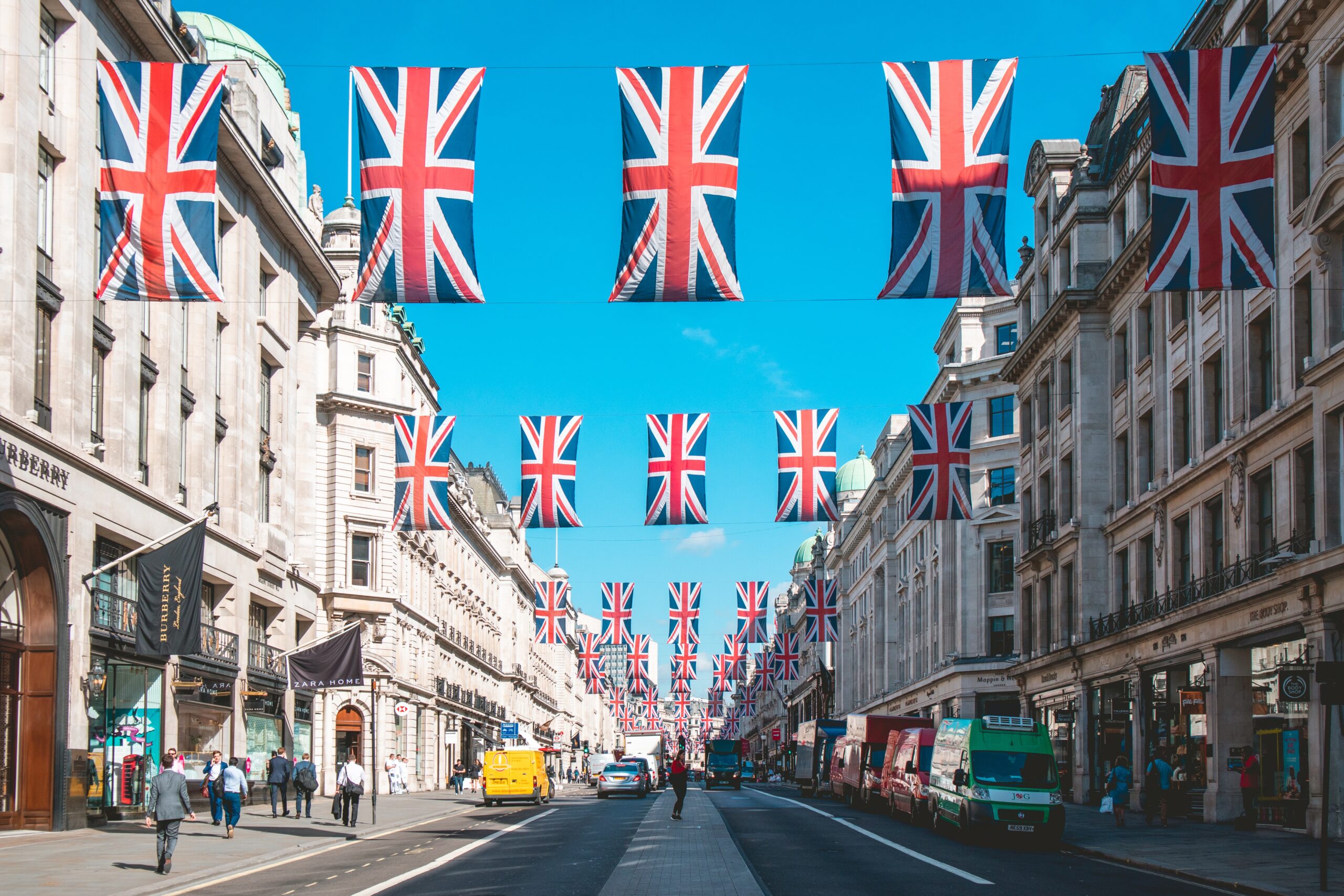 A short trip to London is an opportunity to explore the local culture and see the best there is to see. Check out this three day itinerary that includes the best sites. 
pictured: the streets of London lined with British flags and people