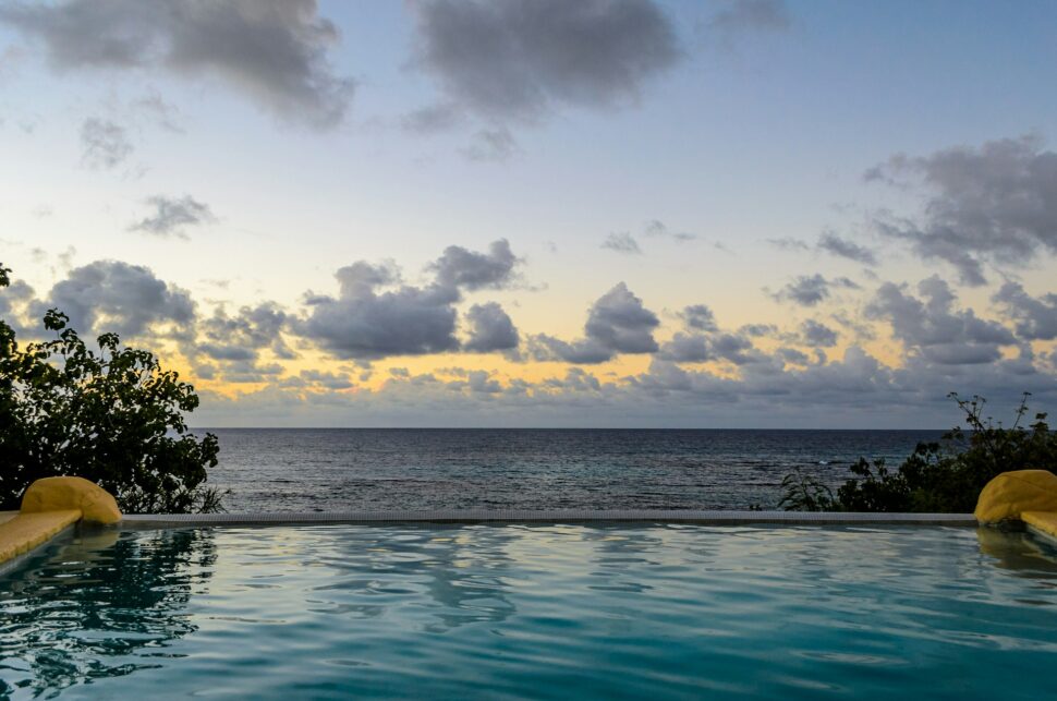 An infinity pool located in front of the ocean in Anguilla.