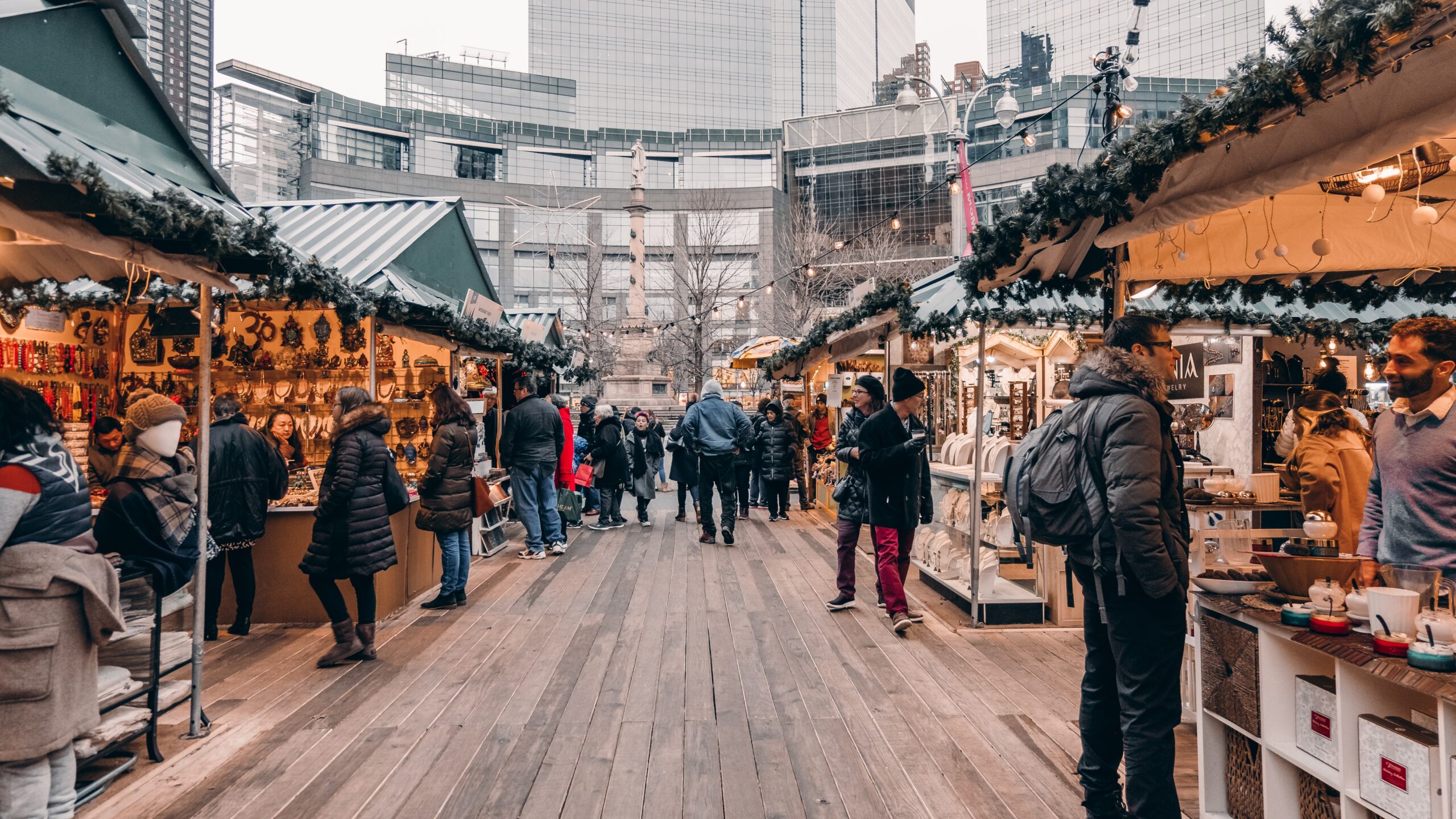 These NYC holiday markets are the best near Christmas time. 
Pictured: the Bryant Park Winter Village with visitors perusing the shops 