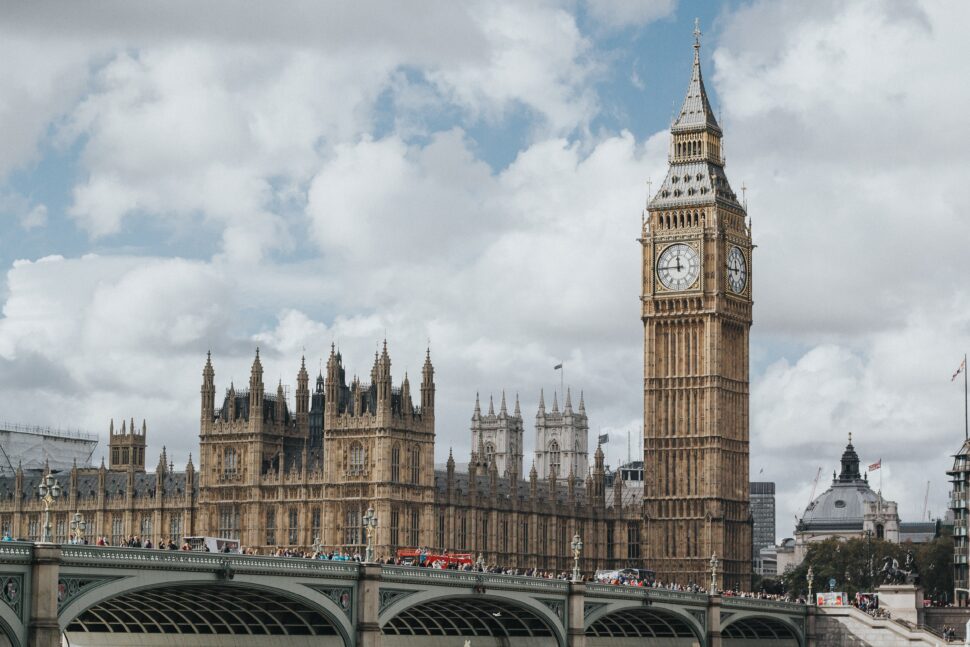 the circle filming location
pictured: cars driving over bridge leading to Big Ben and the Houses of Parliament in London, England