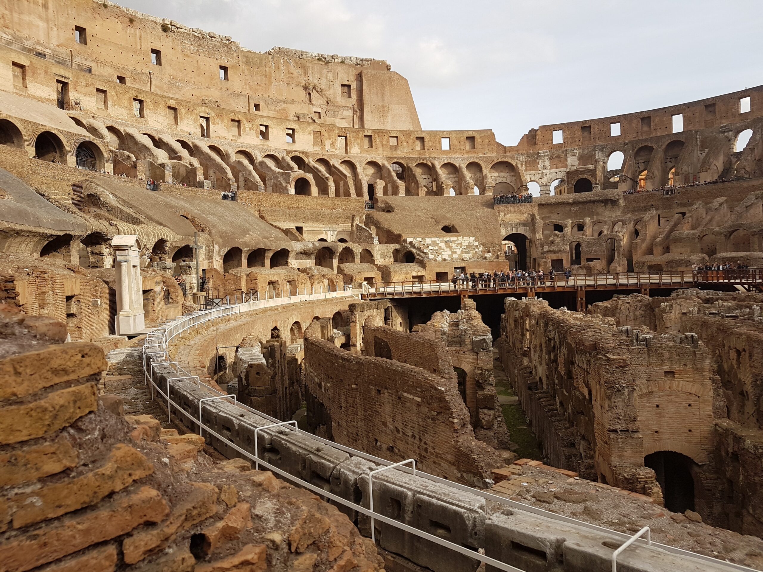 The Colosseum of Rome is an iconic site that still attracts a large amount of tourists due to its jaw dropping architecture and historical significance.
pictured: the Colosseum of Rome, Italy from the interior 