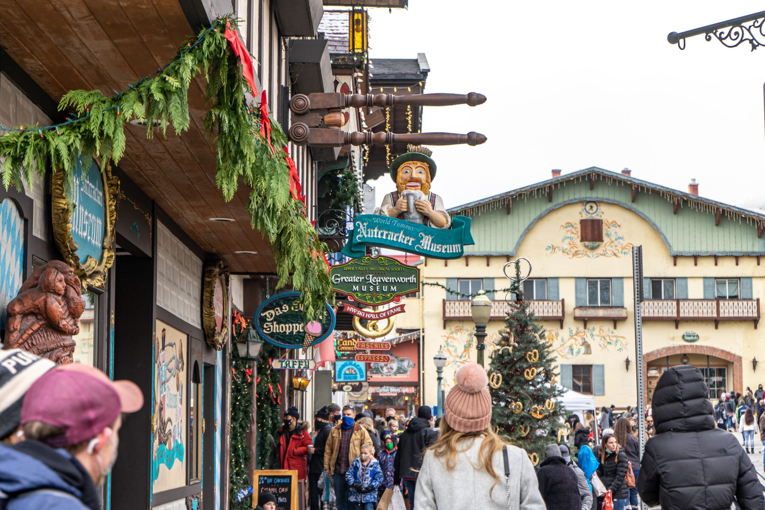 Leavenworth has many festive events and pretty decor throughout the Christmas season. 
pictured: the streets of Leavenworth filled with people during the Christmas market