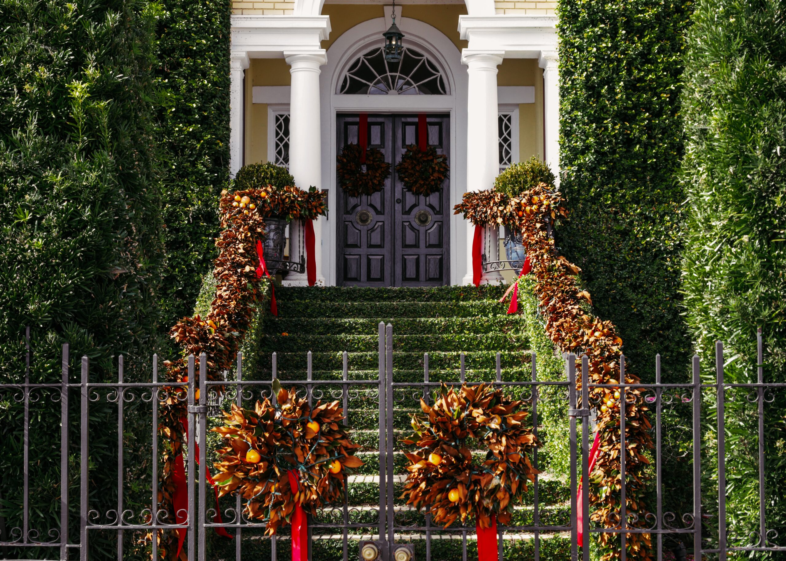 Visit South Carolina for a great active Christmas that you will not forget. 
pictured: a festively decorated front walkway in South Carolina