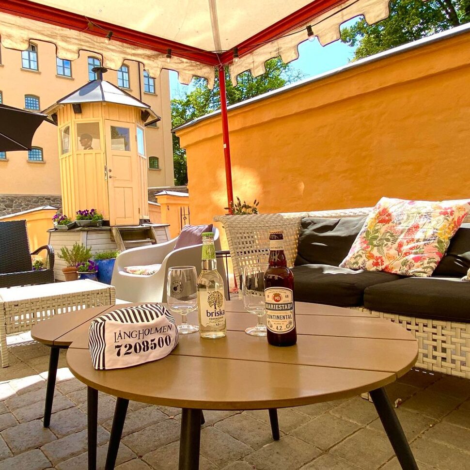 Langholmen Hotel patio deck with outdoor furniture