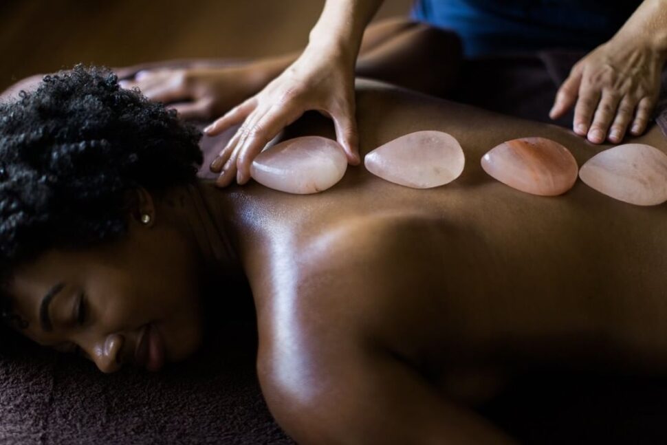 woman getting hot stone massage