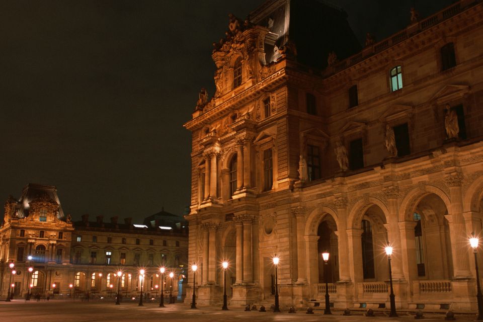 The Louvre Museum at night in Paris