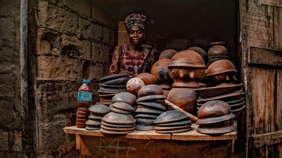 local women selling clay pots and ceramics