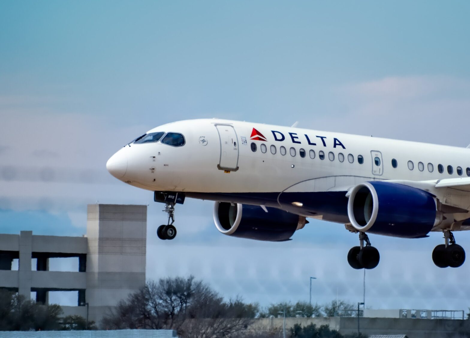 Delta Air Lines Faces Backlash For Style Guide Capitalizing Black and Brown, Not White
