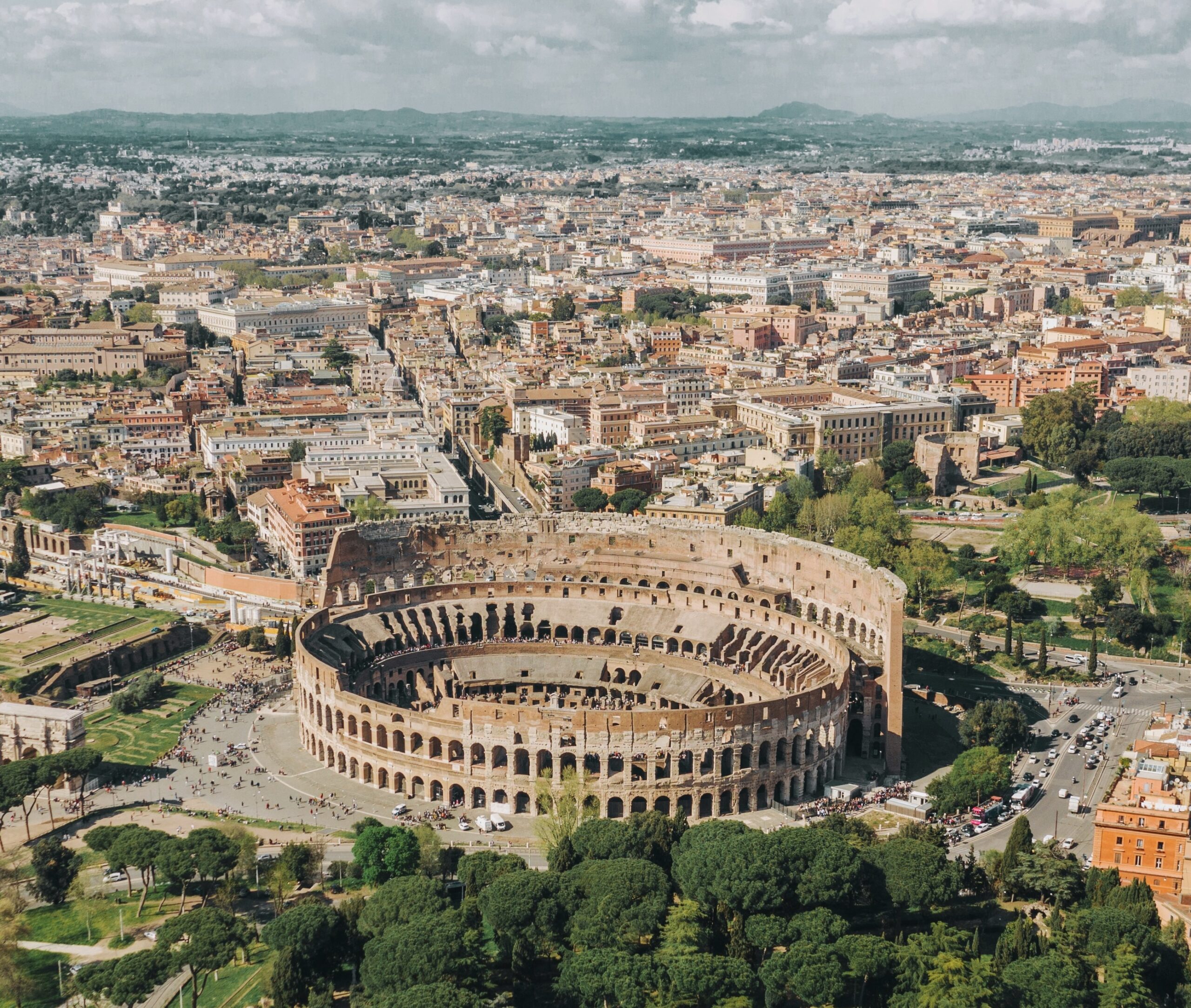 Rome is a wildly popular city in Italy, which is a top option for Europe travelers. 
Pictured: the iconic Colosseum in Rom on a bright day