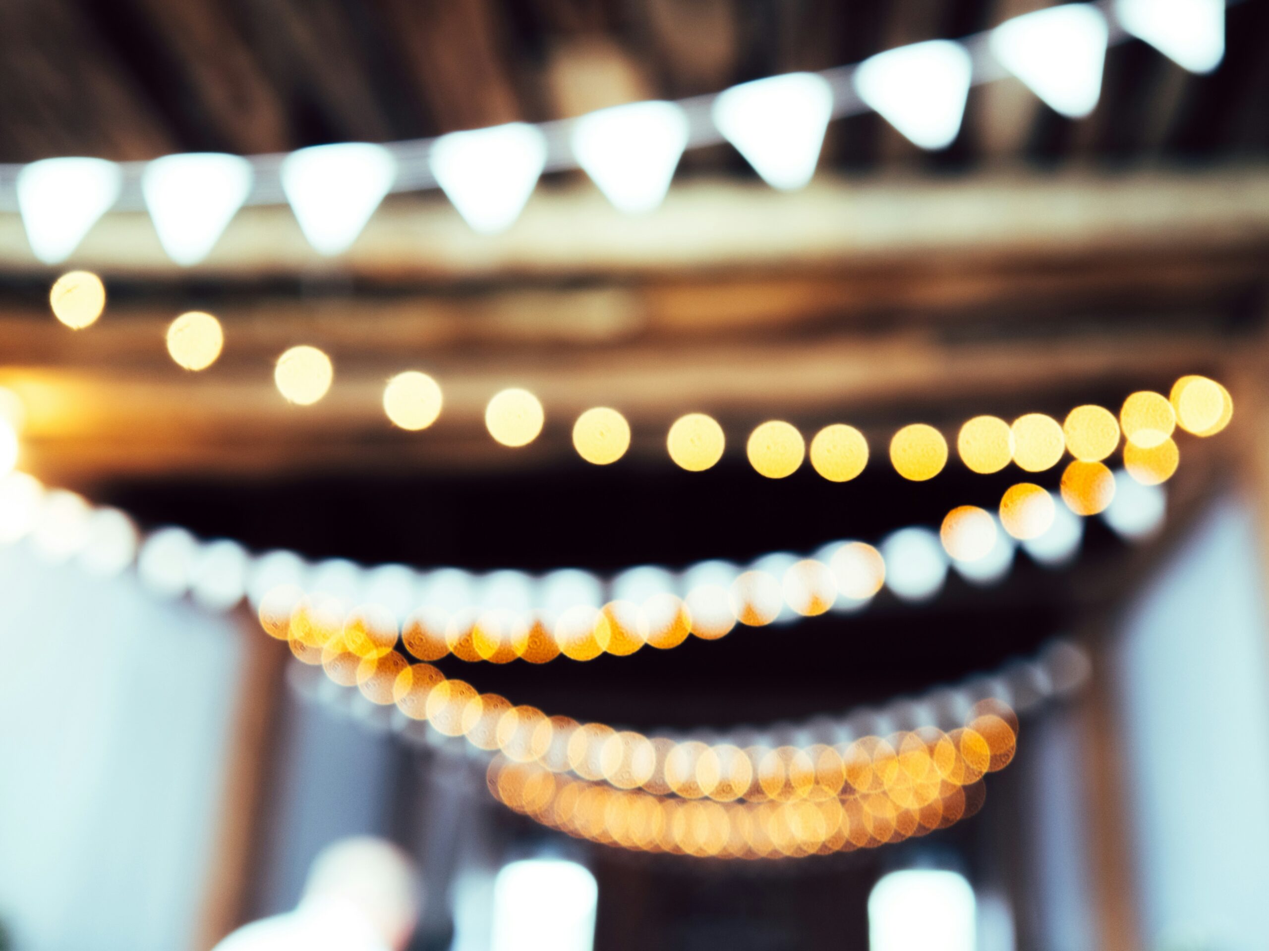 Check out everything that Airbnb users and hosts should know about events and parties. 
pictured: blurred party streamers and lights 