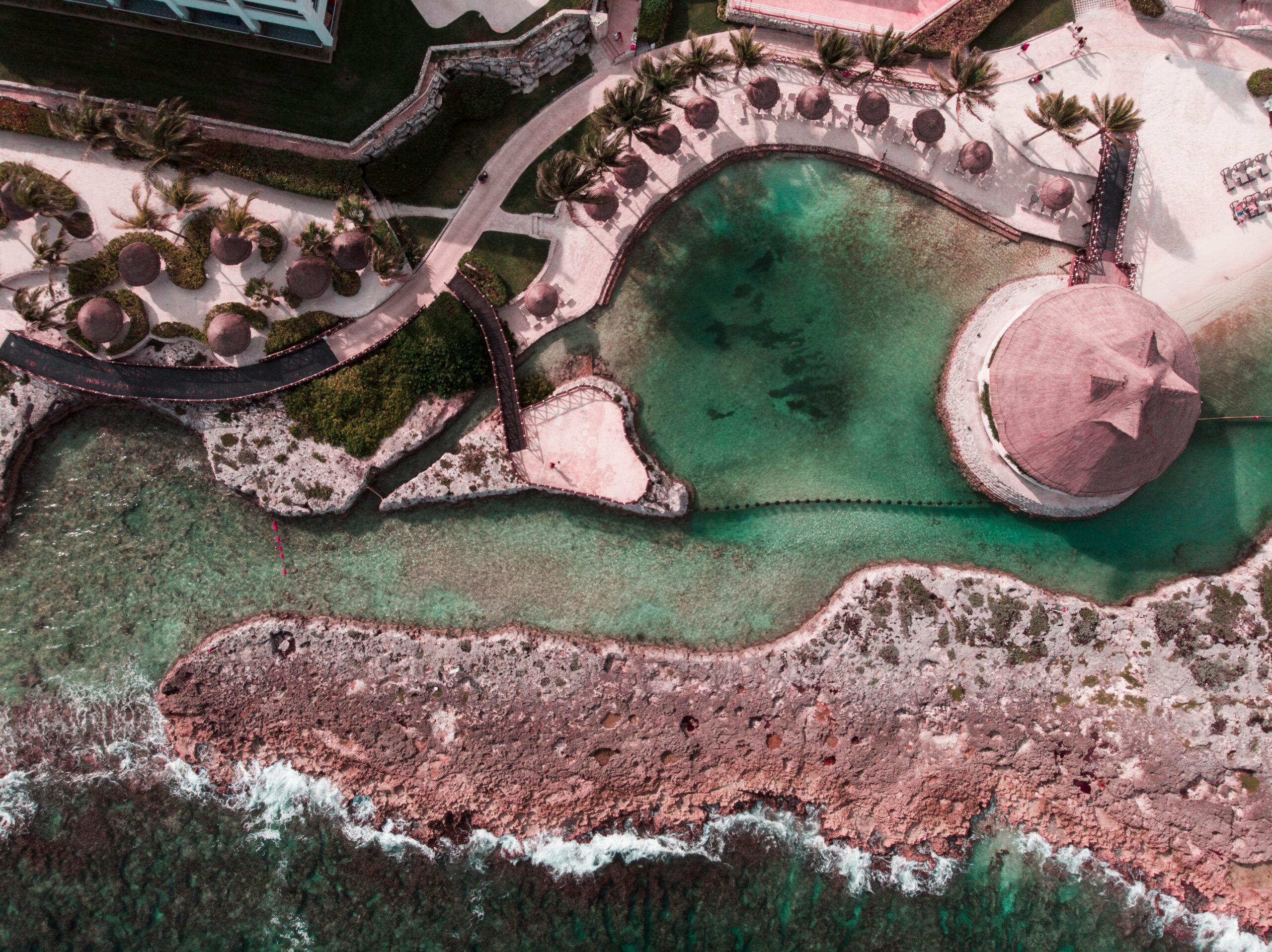 Here are the best ways for travelers to stay safe in Riviera Maya. 
pictured: an aerial view of the coast of Riviera Maya 