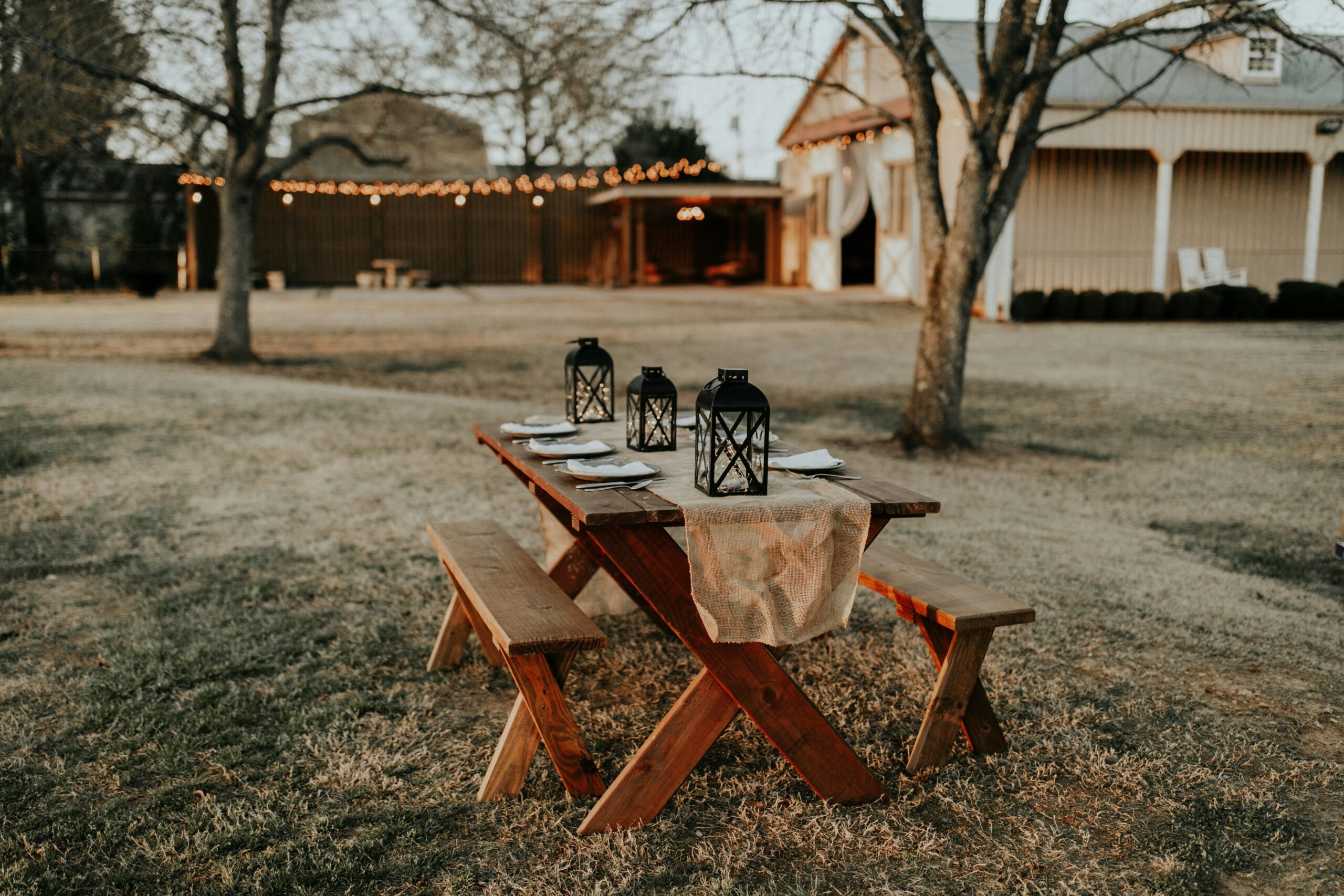After Airbnb's ban on parties, they made these consequences clear for their community of users. 
pictured: a farm house with a decorated picnic table 