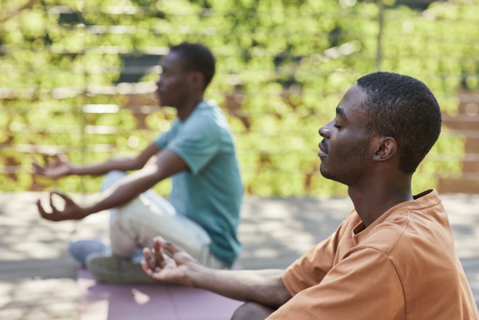 men meditating