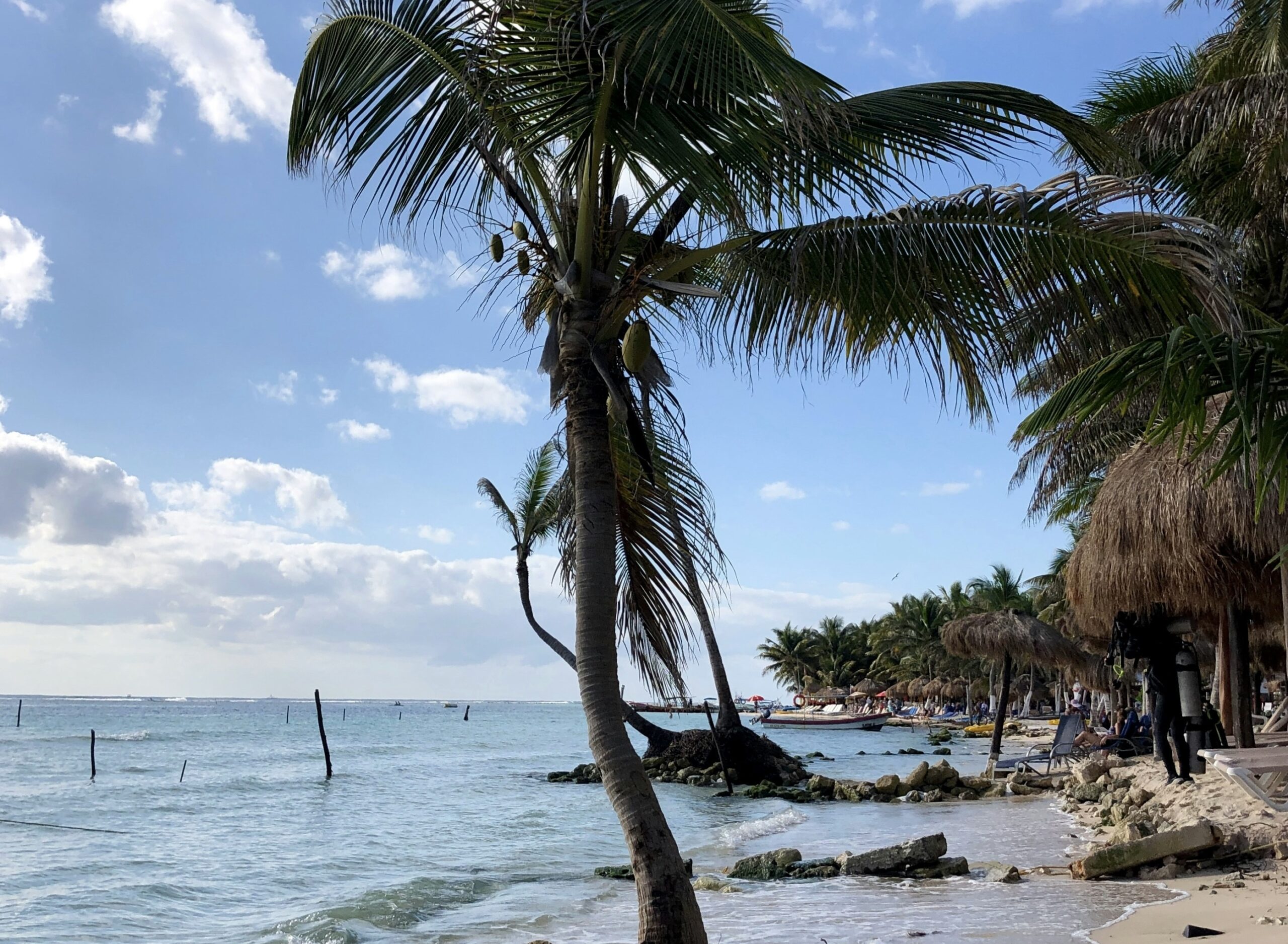 There is plenty for cruisers and travelers to do around the Costa Maya cruise port. 
pictured: a sandy beach and the coast of Costa Maya on a cloudy day
