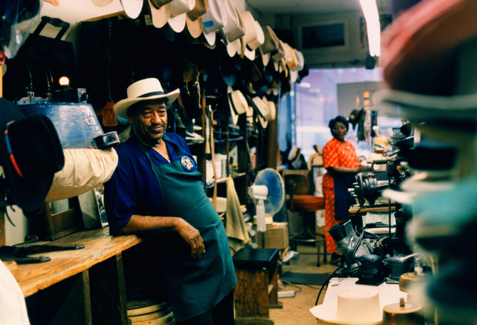people standing in a Black-owned hat maker shop in Nashville