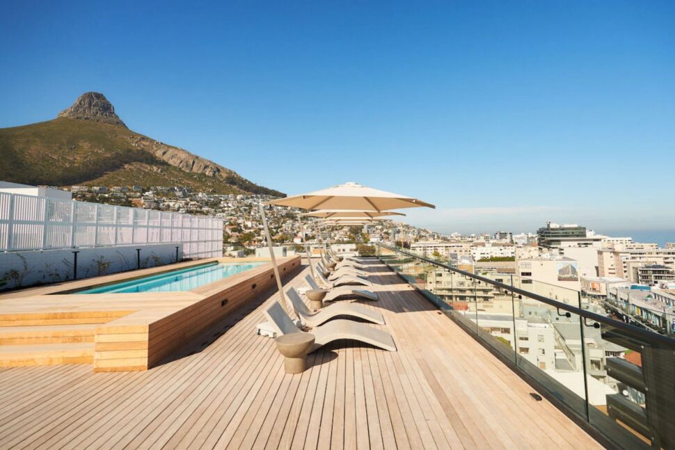 rooftop pool and view of Lion's Head at Home Suite Hotels in Sea Point