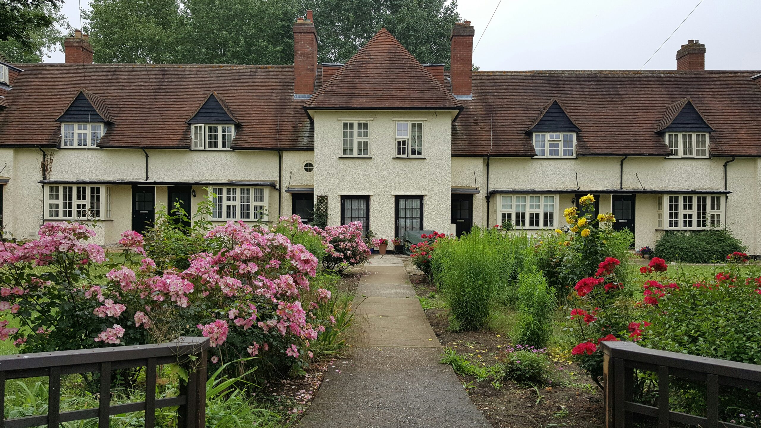 Hertfordshire is a more rural area of England which was featured in the Netflix series "The Gentlemen".
pictured: a English cottage and garden on a bright day