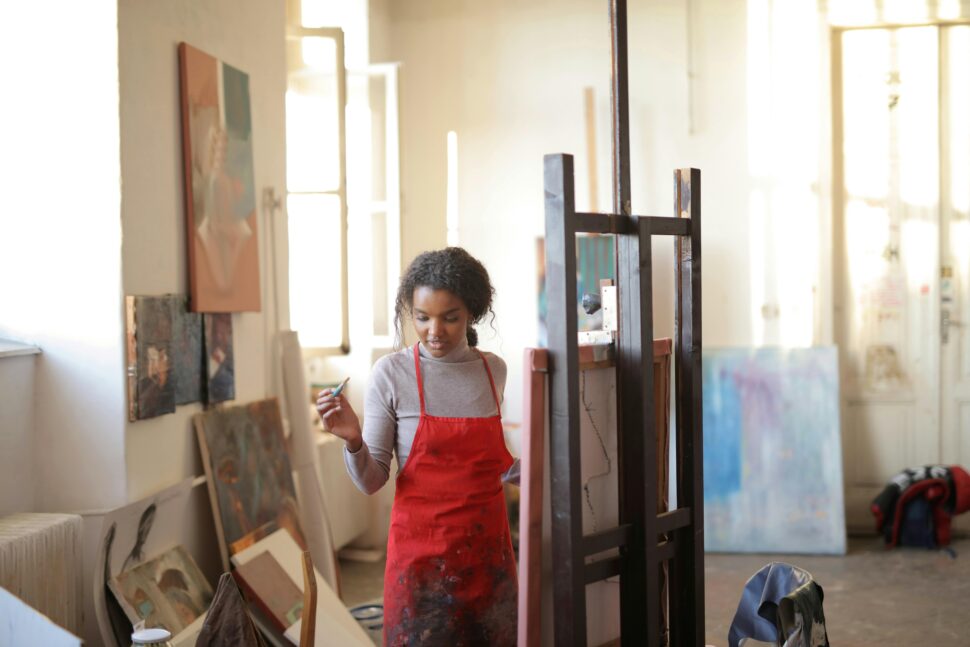 Black woman painting
