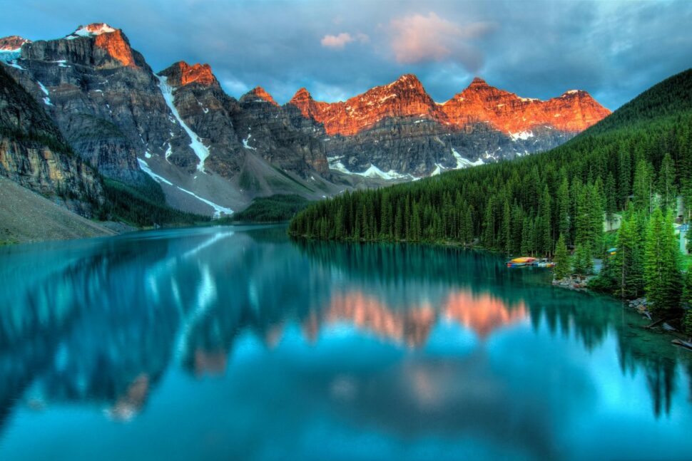 bright blue lake in Banff, Canada during sunset
