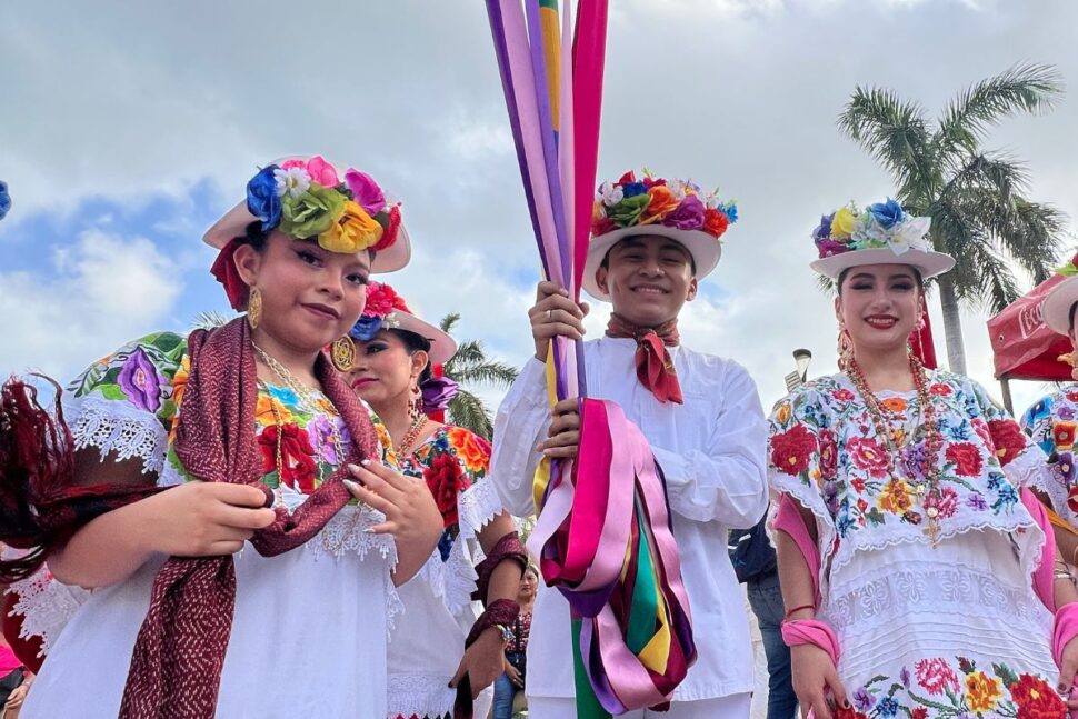 group of traditional dancers before performing at the Cozumel Carnaval
