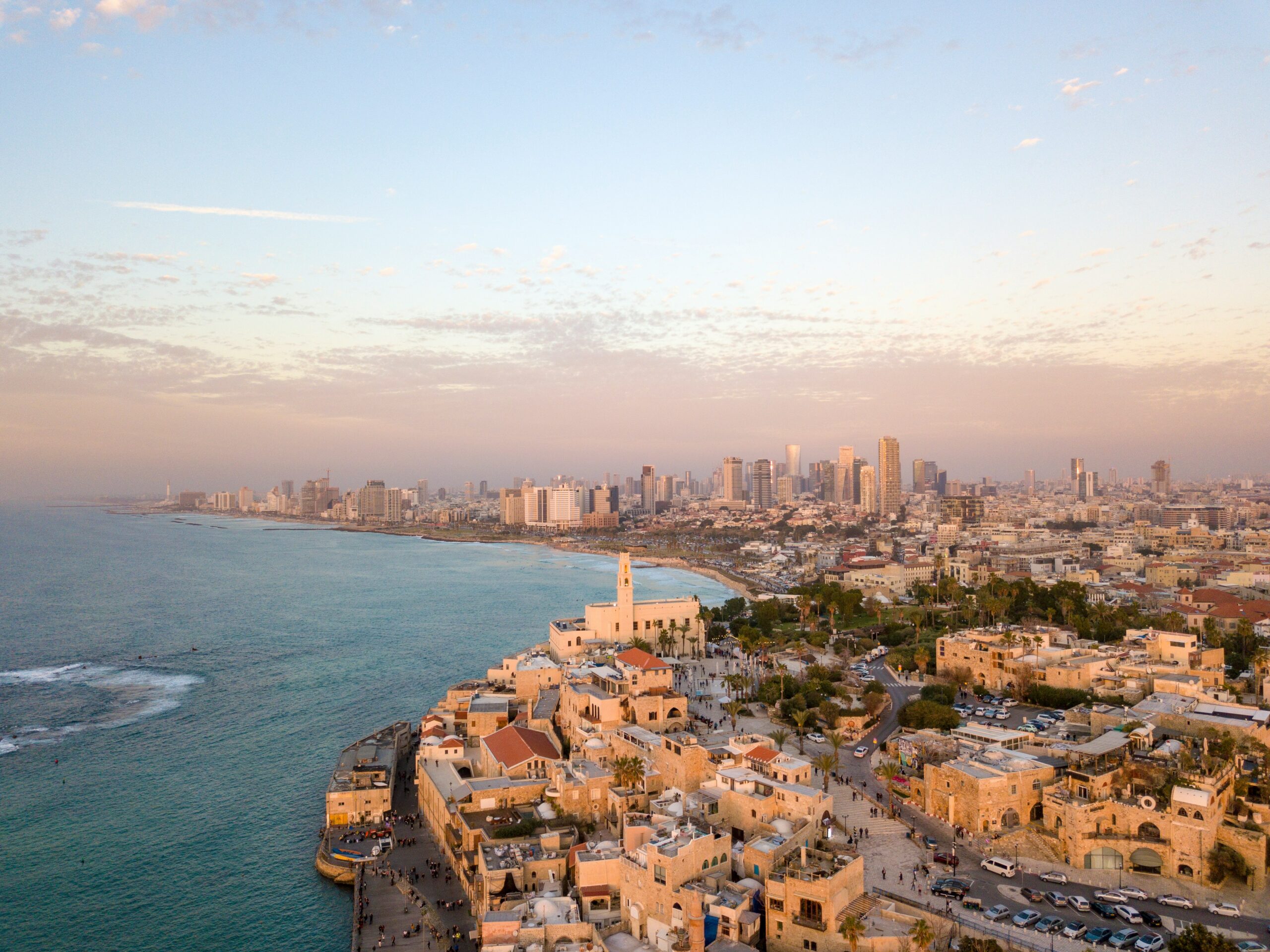 Learn more about the escalating situation between Israel and Iran. Pictured: a view of Israel’s coast near sunset