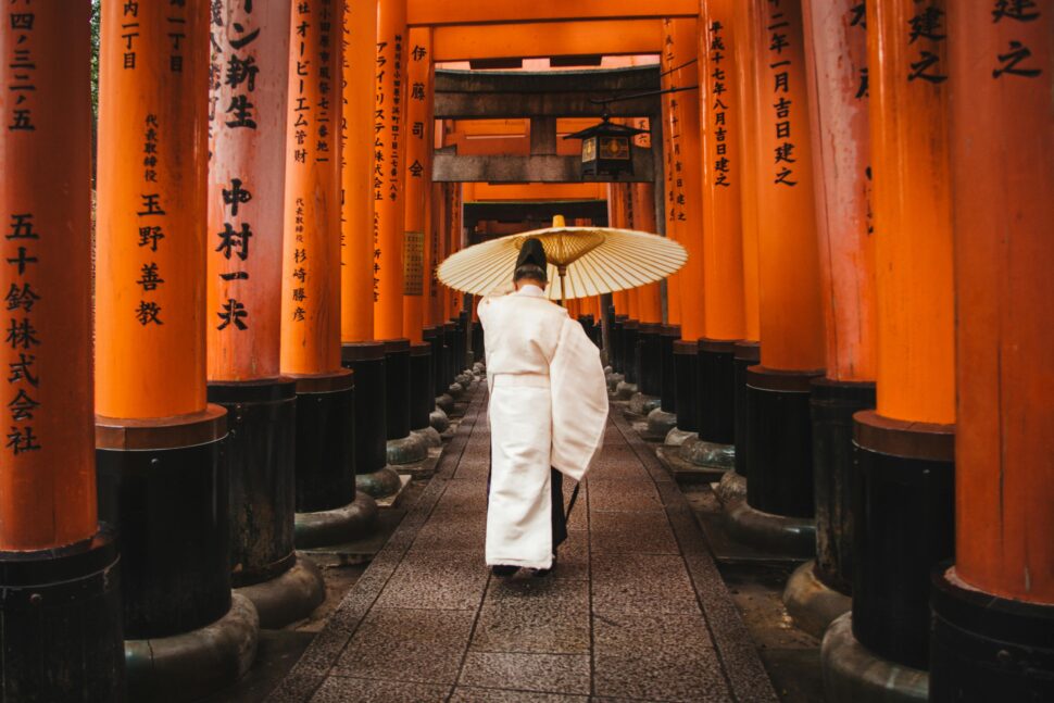 woman walking in Japan with umbrella