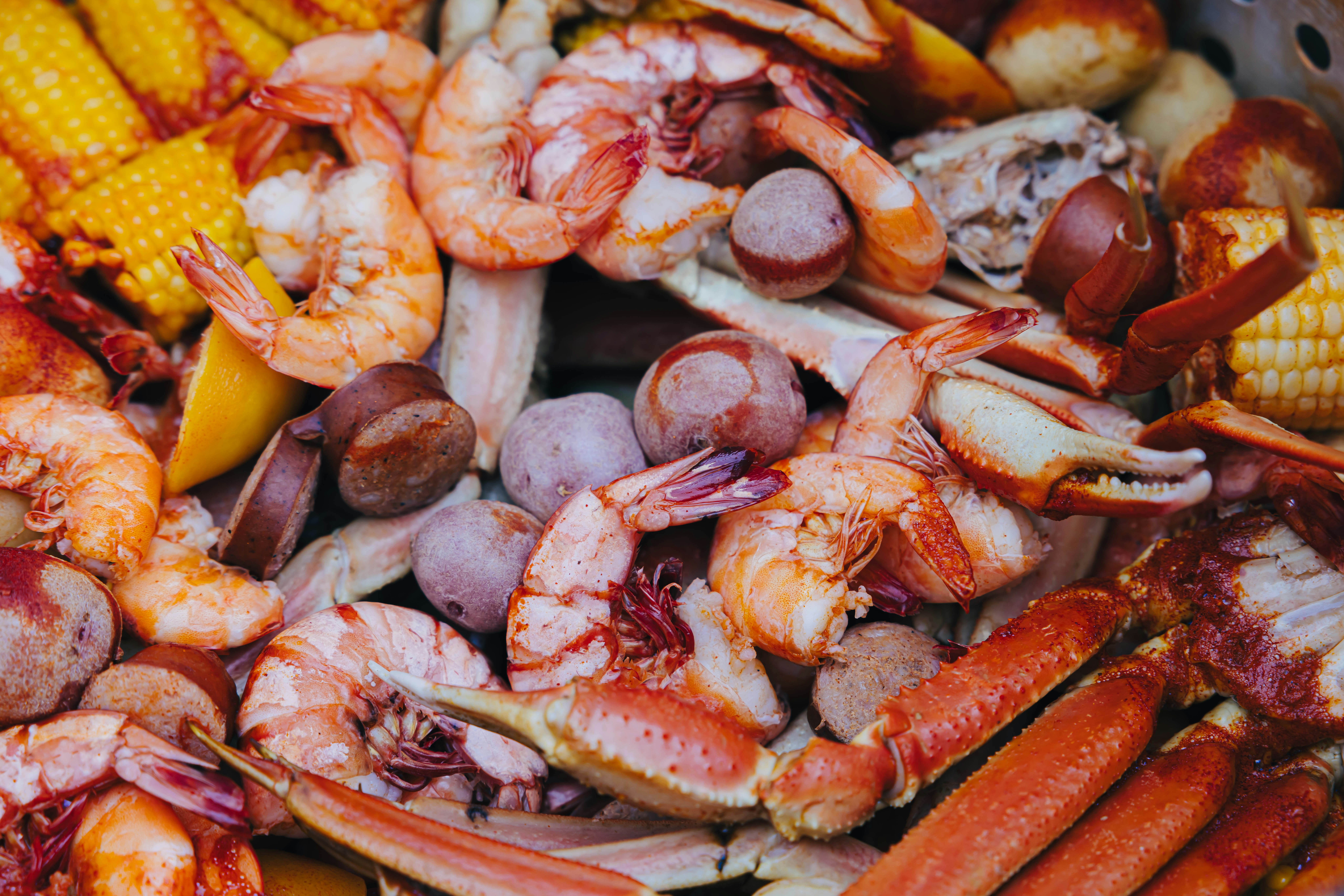 Food is an important part of New Orlean's culture that travelers can especially enjoy with Marches weather. 
pictured: a seafood boil