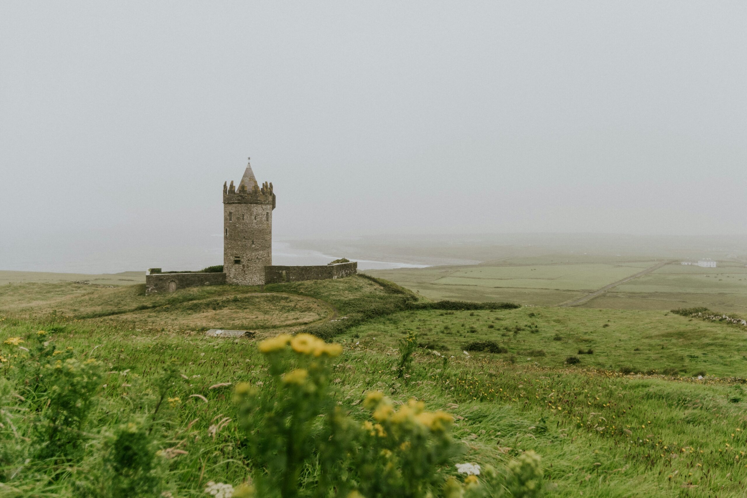 Check out this historic town and what travelers can see. 
pictured: a castle in the countryside of Ireland