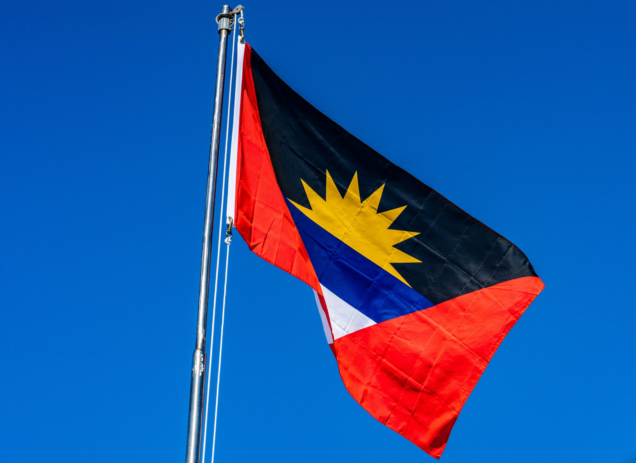 There are historic sites in Antigua that travelers can explore during their trip abroad. 
Pictured: the Antigua flag