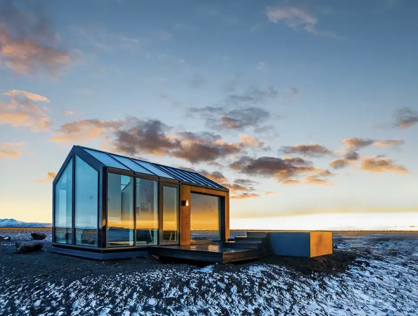 This cottage in Iceland may be the perfect getaway for couples checking Airbnb.
pictured: the glass cottage in Iceland 