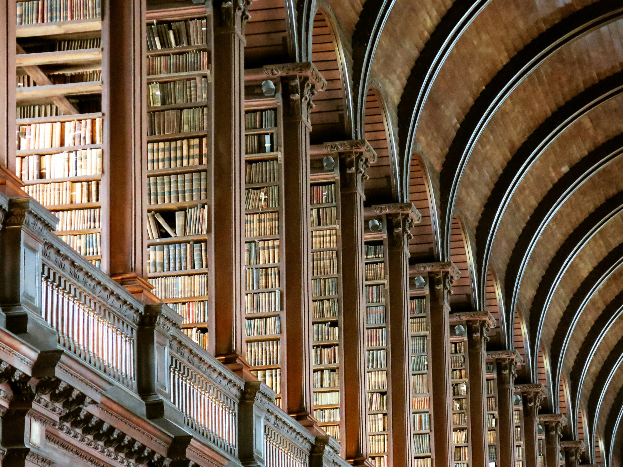 Learn about this significant library that travelers should not miss. 
pictured: the library of Trinity College Dublin 