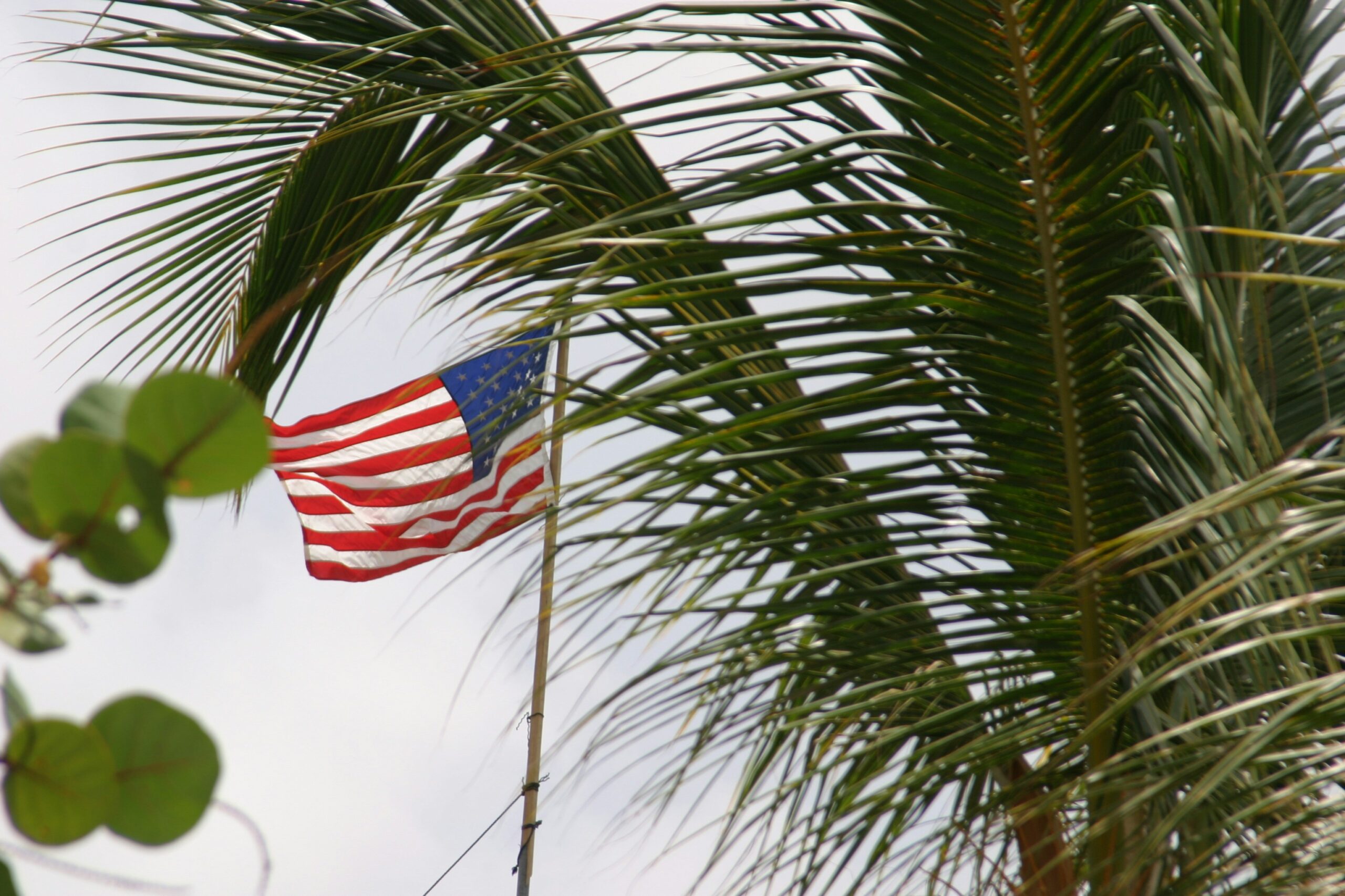 The weather during the spring is why it is the best time to visit the Virgin Islands. 
Pictured: the U.S. flag in tropical destination 
