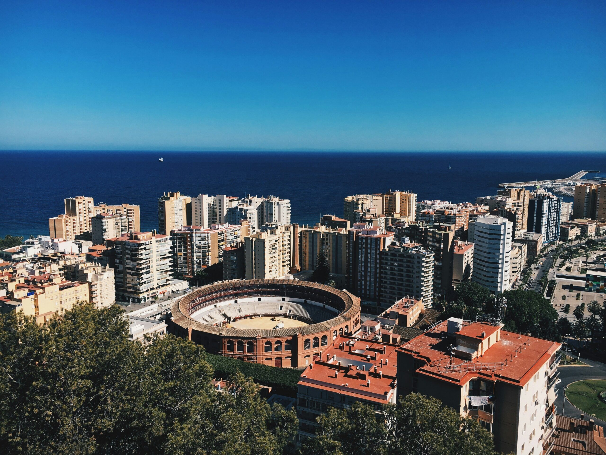 Learn more about structural issues that increase the need for a railway in Spain. 
pictured: Malaga cityscape